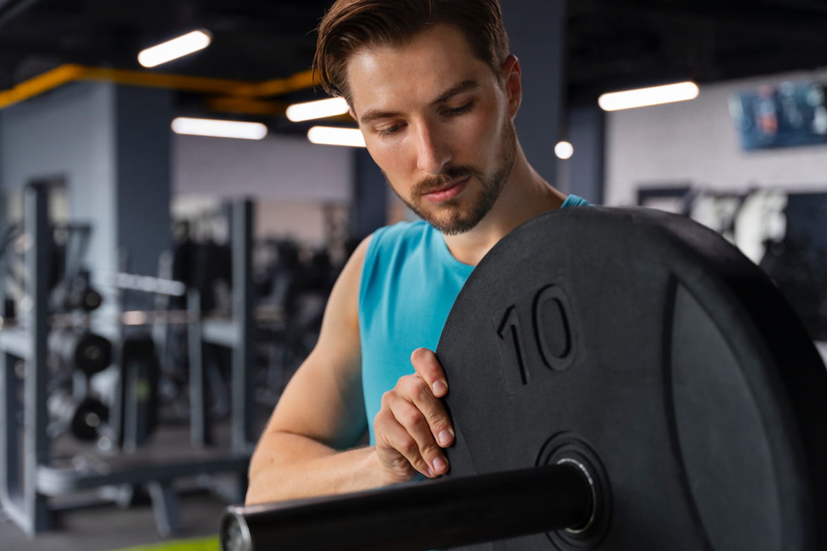 cómo elegir el peso en el gym con progresión semana a semana.